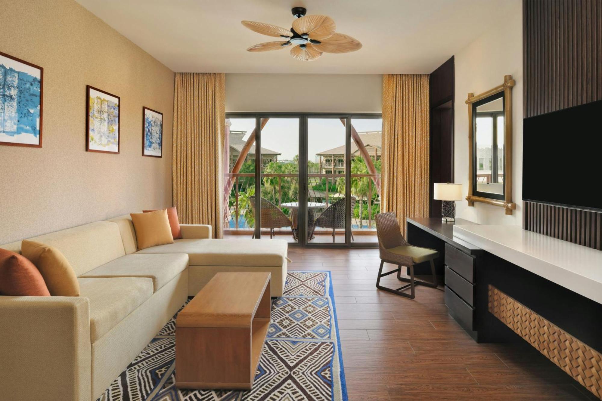 Lapita, Dubai Parks And Resorts, Autograph Collection Exterior foto A living room at Hilton Garden Inn, Chennai